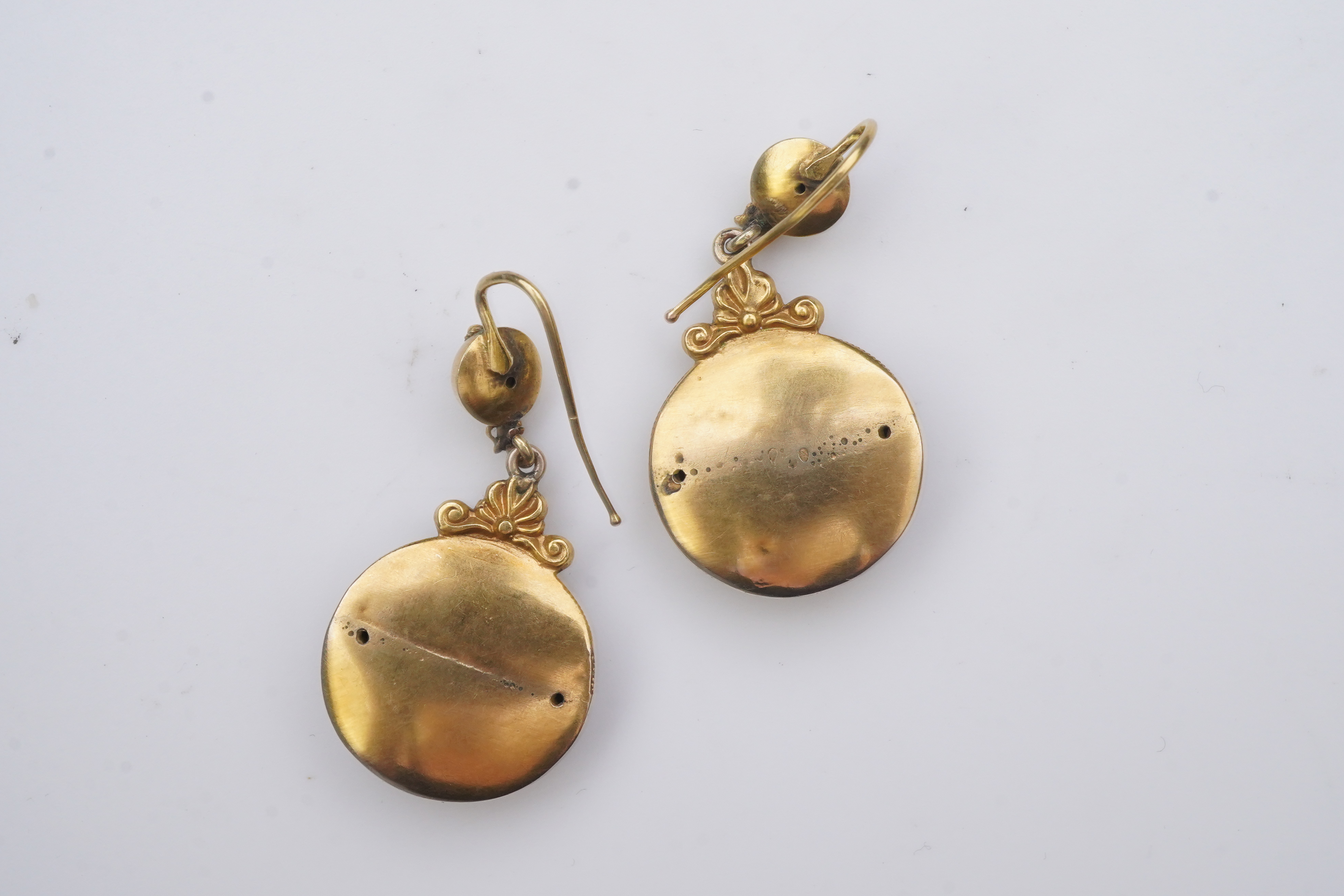 A pair of Victorian emerald and gold earrings, third quarter 19th century